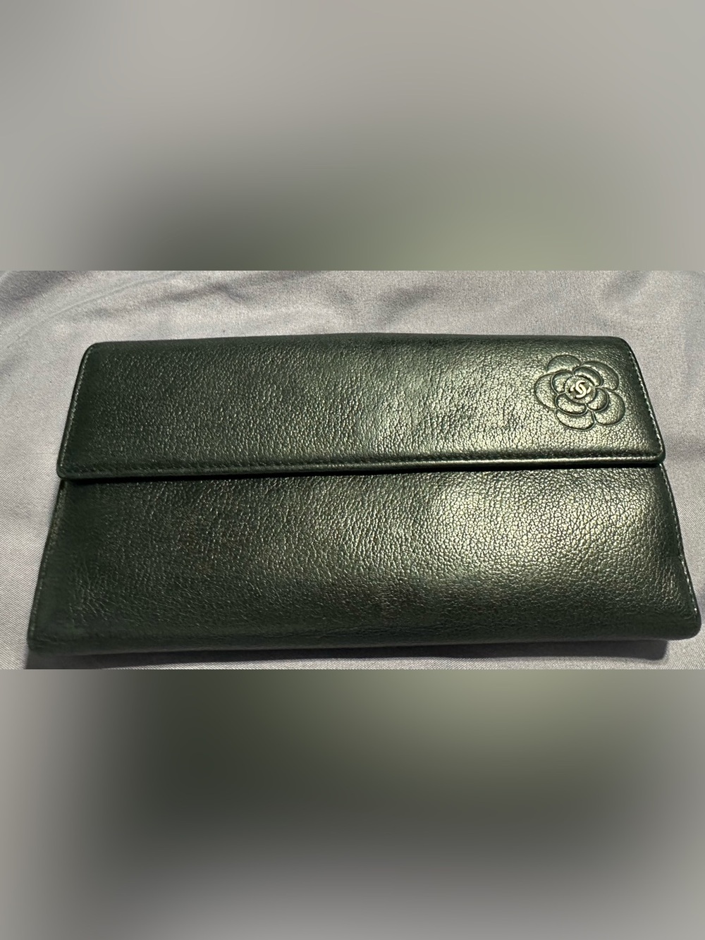 Chanel Camellia long wallet in black grained leather.with COA